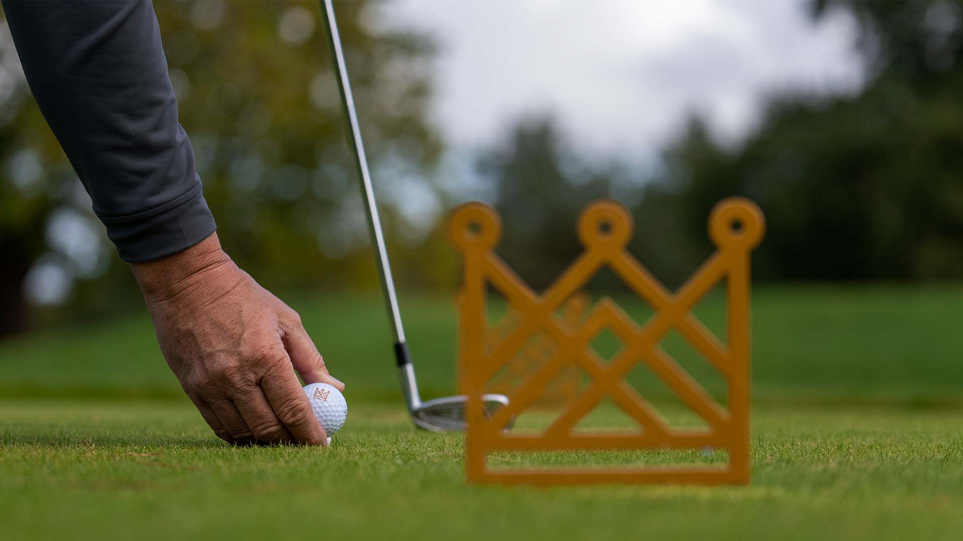 Golfer with golf ball